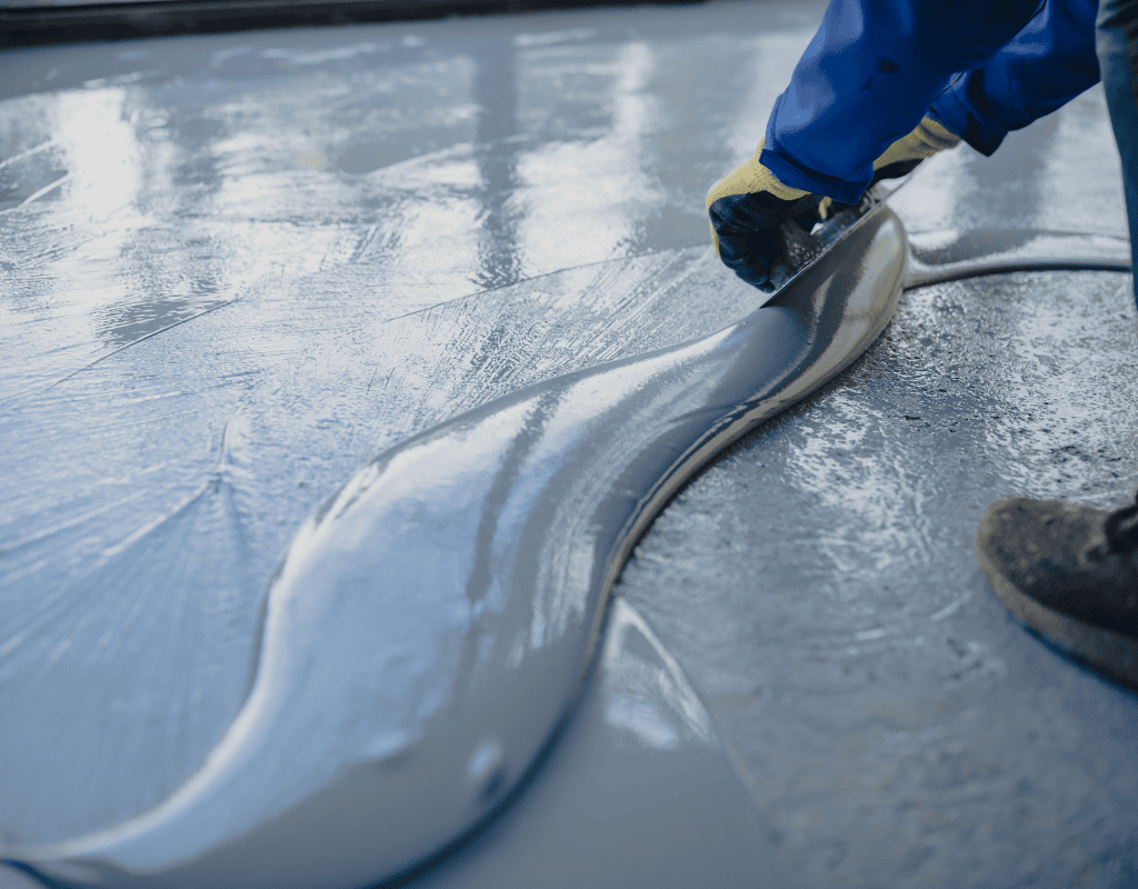 professional applying concrete coating for durable flooring in Bergen County NJ