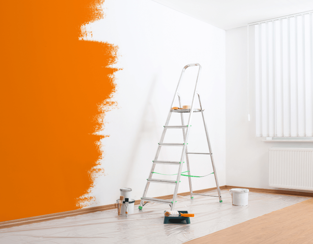 freshly painted interior wall with ladder and painting tools in Bergen County NJ